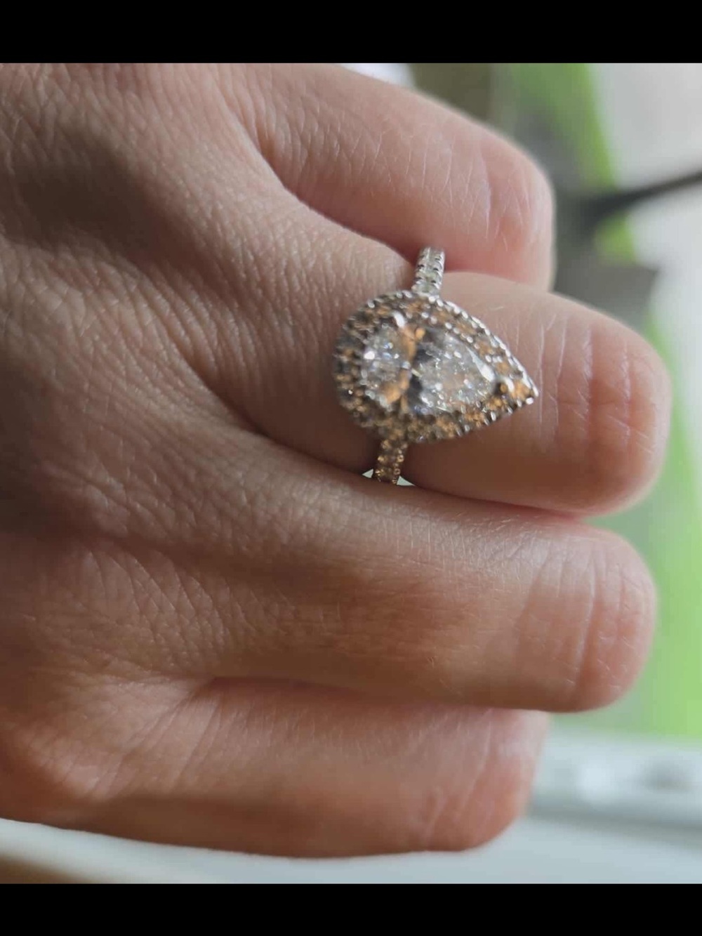 Pear-Shaped Halo Diamond Ring in Silver